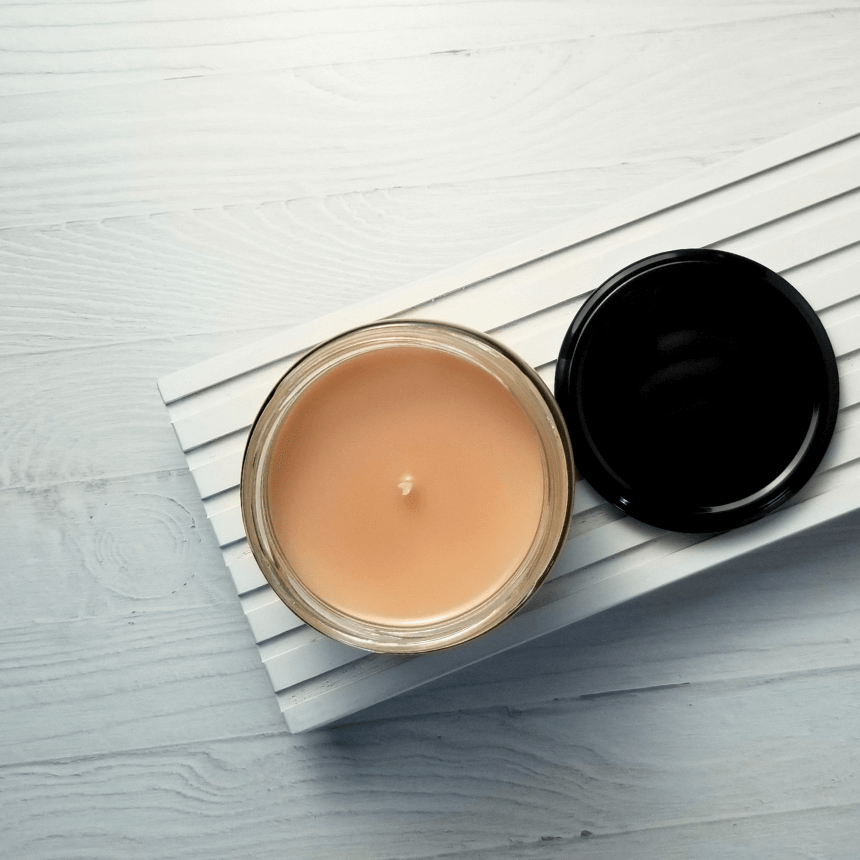 Top-down view of the Red Jam Thumbprint candle.