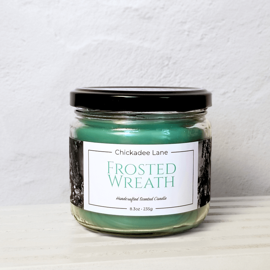 Product photo for Frosted Wreath candle.
